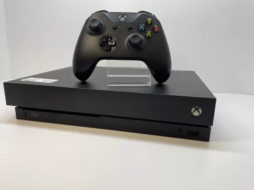 Xbox One X 1 TB használt , újrapaszázva 6 hó garancia  új bontatlan kontrollerrel 